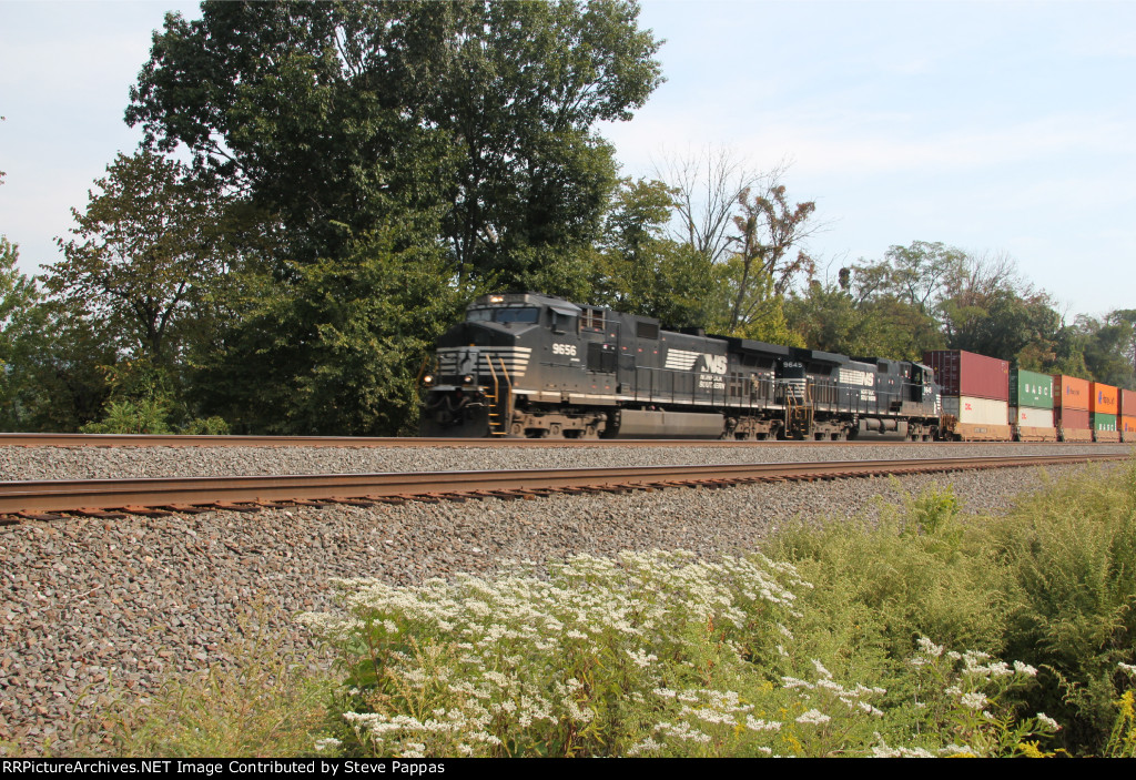 NS 9656 takes train 23Z west past MP116